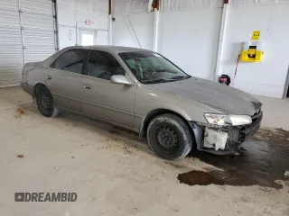 1997 Toyota Camry LE с VIN 4T1BG22K2VU087152, выставлен на аукционе Copart как лот 54049895 с пробегом 229 520 миль миль и Списание • Salvage title. История ставок и продаж доступна на DreamBid. Изображение 4.