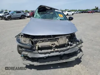 2022 Honda Civic Sport z VIN 2HGFE2F54NH515517, wystawiony jako Copart lot #54695585 z przebiegiem Nie podano mil oraz Szkoda całkowita • Salvage title. Historia ofert i sprzedaży dostępna na DreamBid. Obrazek 5.