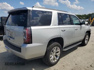 2016 GMC Yukon SLT with VIN 1GKS1BKC1GR413225, listed as a Copart auction lot 66547034 with 56,073 mi miles and Salvage Title. Bid and sale history available at carsss.com. Image 3.