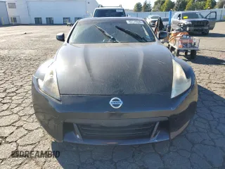 2012 Nissan 370Z Touring with VIN JN1AZ4EH4CM561432, listed as a Copart auction lot 89376935 with 128,955 mi miles and Salvage Title. Bid and sale history available at carsss.com. Image 5.