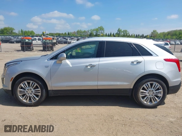 2017 Cadillac XT5 Premium Luxury AWD z VIN 1GYKNERS6HZ112170, wystawiony jako IAAI lot #42262116 z przebiegiem 140 982 mil mil oraz . Historia ofert i sprzedaży dostępna na DreamBid. Obrazek 14.