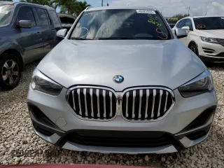 2021 BMW X1 sDrive28i with VIN WBXJG7C04M5S29295, listed as a Copart auction lot 48922203 with 14,214 mi miles. Bid and sale history available at carsss.com. Image 5.