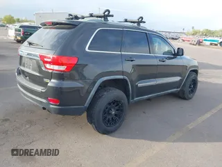 2011 Jeep Grand Cherokee 70th Anniversary with VIN 1J4RR4GG1BC588848, listed as a IAAI auction lot 42117042 with 168,273 mi miles. Bid and sale history available at carsss.com. Image 4.
