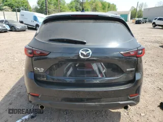 2024 Mazda CX-5 S Carbon Edition z VIN JM3KFBCL8R0489292, wystawiony jako Copart lot #55098625 z przebiegiem 11 132 mil mil oraz Szkoda całkowita • Salvage title. Historia ofert i sprzedaży dostępna na DreamBid. Obrazek 6.
