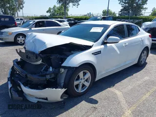 2015 Kia Optima LX z VIN KNAGM4A71F5594595, wystawiony jako IAAI lot #42226773 z przebiegiem 133 194 mil mil oraz . Historia ofert i sprzedaży dostępna na DreamBid. Obrazek 2.