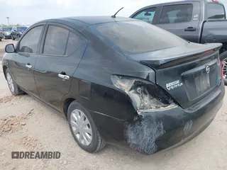 2014 Nissan Versa SV with VIN 3N1CN7AP1EL822984, listed as a IAAI auction lot 42124959 with 126,900 mi miles. Bid and sale history available at carsss.com. Image 3.