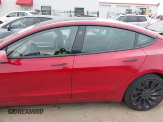 2022 Tesla Model 3 Performance with VIN 5YJ3E1ECXNF329188, listed as a IAAI auction lot 41308371 with 15,220 mi miles and . Bid and sale history available at DreamBid. Image 15.