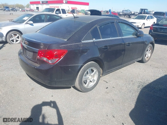 2011 Chevrolet Cruze LT w/2LT with VIN 1G1PG5S90B7128292, listed as a IAAI auction lot 41848633 with 182,963 mi miles. Bid and sale history available at carsss.com. Image 4.