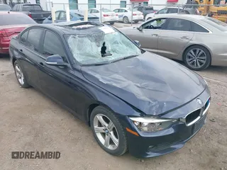 2015 BMW 3 Series 328i xDrive with VIN WBA3B3C54FF547033, listed as a IAAI auction lot 41184204 with 87,664 mi miles. Bid and sale history available at carsss.com. Image 1.