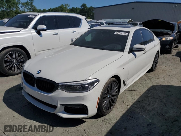 2018 BMW 5 Series 540i xDrive with VIN WBAJE7C52JG891212, listed as a Copart auction lot 58119195 with 73,770 mi miles and Salvage title. Bid and sale history available at DreamBid. Image 1.