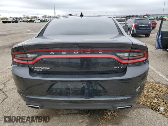 2015 Dodge Charger SXT with VIN 2C3CDXJG3FH919988, listed as a Copart auction lot 49340374 with 99,200 mi miles and Salvage title. Bid and sale history available at DreamBid. Image 6.