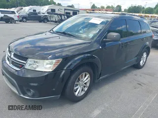2013 Dodge Journey SXT with VIN 3C4PDCBG6DT501871, listed as a IAAI auction lot 42553305 with 184,226 mi miles and . Bid and sale history available at DreamBid. Image 2.