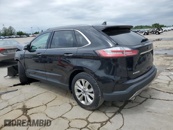 2020 Ford Edge Titanium с VIN 2FMPK3K93LBB56277, выставлен на аукционе Copart как лот 57502985 с пробегом 80 352 миль миль и Списание • Salvage title. История ставок и продаж доступна на DreamBid. Изображение 2.