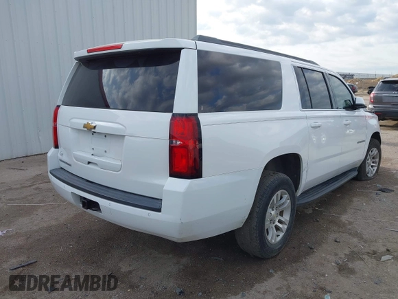 2015 Chevrolet Suburban LT with VIN 1GNSCJKC9FR702598, listed as a IAAI auction lot 41909771 with 150,206 mi miles and . Bid and sale history available at DreamBid. Image 4.