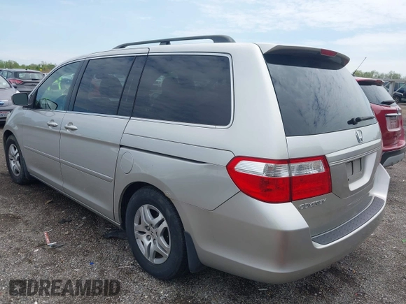 2007 Honda Odyssey EX-L with VIN 5FNRL38767B455948, listed as a IAAI auction lot 42154879 with 232,645 mi miles and . Bid and sale history available at DreamBid. Image 3.