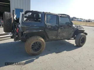 2012 Jeep Wrangler Unlimited Sahara with VIN 1C4BJWEG5CL235835, listed as a Copart auction lot 60673555 with 86,606 mi miles and Salvage title. Bid and sale history available at DreamBid. Image 3.