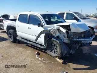 2022 Toyota Tacoma SR with VIN 3TMCZ5AN1NM498224, listed as a IAAI auction lot 40866799 with 76,588 mi miles and . Bid and sale history available at DreamBid. Image 1.