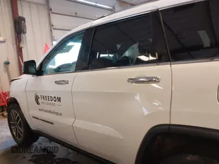 2021 Jeep Grand Cherokee 80th Anniversary with VIN 1C4RJFBG6MC569585, listed as a IAAI auction lot 41341608 with 73,234 mi miles and . Bid and sale history available at DreamBid. Image 14.