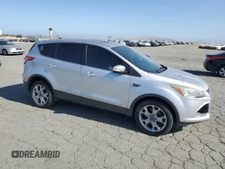 2013 Ford Escape SEL с VIN 1FMCU9H97DUD80585, выставлен на аукционе Copart как лот 60882115 с пробегом 171 254 миль миль и Чистый • Clean title. История ставок и продаж доступна на DreamBid. Изображение 4.