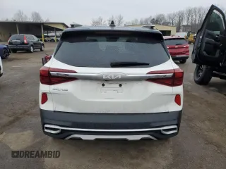 2022 Kia Seltos SX with VIN KNDETCA23N7299979, listed as a Copart auction lot 42940095 with 27,315 mi miles and Salvage title. Bid and sale history available at DreamBid. Image 6.