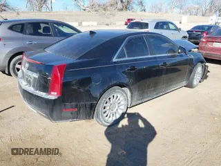 2011 Cadillac CTS Sedan Luxury with VIN 1G6DG5EY9B0127635, listed as a IAAI auction lot 41661852 with 124,199 mi miles. Bid and sale history available at carsss.com. Image 4.