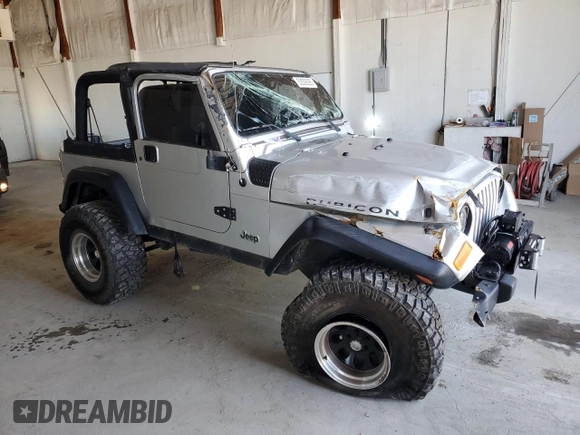 2006 Jeep Wrangler Rubicon with VIN 1J4FA69S26P734731, listed as a Copart auction lot 52009295 with 117,872 mi miles and Salvage title. Bid and sale history available at DreamBid. Image 4.