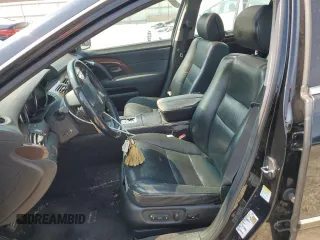 2006 Acura RL with VIN JH4KB16586C003133, listed as a Copart auction lot 63238494 with 228,039 mi miles and Salvage Title. Bid and sale history available at DreamBid. Image 7.