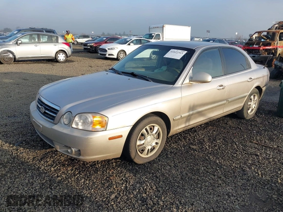 2004 Kia Optima LX z VIN KNAGD126045302372, wystawiony jako IAAI lot #41022315 z przebiegiem 199 588 mil mil oraz . Historia ofert i sprzedaży dostępna na DreamBid. Obrazek 2.