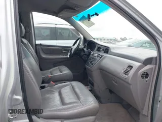 2003 Honda Odyssey EX-L z VIN 5FNRL18033B096575, wystawiony jako IAAI lot #41576926 z przebiegiem 210 932 mil mil oraz . Historia ofert i sprzedaży dostępna na DreamBid. Obrazek 5.