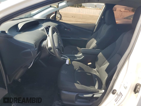 2021 Toyota Prius L Eco z VIN JTDKAMFU4M3145800, wystawiony jako Copart lot #59180285 z przebiegiem 33 991 mil mil oraz Czysty tytuł • Clean title. Historia ofert i sprzedaży dostępna na DreamBid. Obrazek 7.