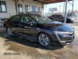 2018 Honda Clarity Touring z VIN JHMZC5F37JC007376, wystawiony jako Copart lot #52385225 z przebiegiem 64 062 mil mil oraz Szkoda całkowita • Salvage title. Historia ofert i sprzedaży dostępna na DreamBid. Obrazek 4.