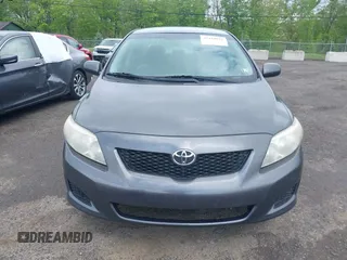 2009 Toyota Corolla with VIN JTDBL40E999048446, listed as a IAAI auction lot 42210822 with 260,005 mi miles. Bid and sale history available at carsss.com. Image 6.