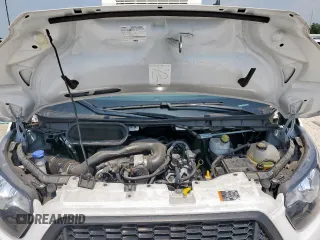 2023 Ford Transit Cargo с VIN 1FTBR1Y81PKB48106, выставлен на аукционе Copart как лот 57442685 с пробегом 11 889 миль миль и Списание • Salvage title. История ставок и продаж доступна на DreamBid. Изображение 12.