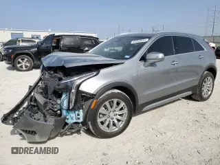 2023 Cadillac XT4 FWD Premium Luxury with VIN 1GYFZCR49PF124275, listed as a Copart auction lot 65359634 with 25,701 mi miles and Salvage Title. Bid and sale history available at carsss.com. Image 1.