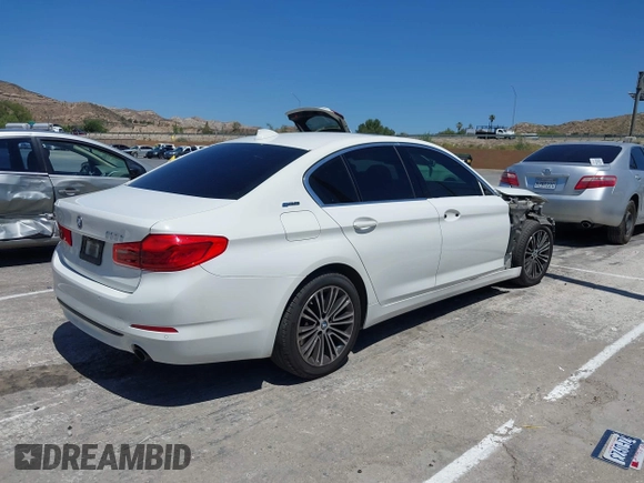 2019 BMW 5 Series 530e with VIN WBAJA9C53KB391999, listed as a IAAI auction lot 42311824 with 79,196 mi miles and . Bid and sale history available at DreamBid. Image 4.