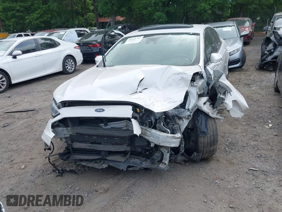 2017 Ford Fusion Titanium with VIN 3FA6P0K96HR105127, listed as a IAAI auction lot 39351701 with 103,295 mi miles. Bid and sale history available at carsss.com. Image 6.