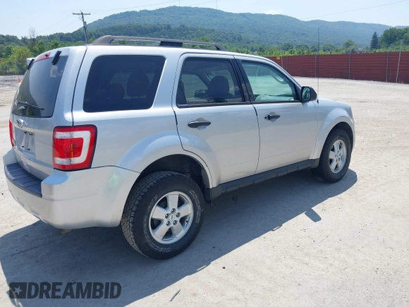 2012 Ford Escape XLT with VIN 1FMCU9D77CKC48442, listed as a IAAI auction lot 42824053 with 78,370 mi miles and . Bid and sale history available at DreamBid. Image 4.