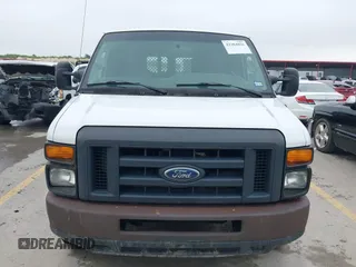2014 Ford Econoline Cargo Commercial z VIN 1FTNE2EW7EDA00870, wystawiony jako IAAI lot #42384856 z przebiegiem 156 312 mil mil oraz . Historia ofert i sprzedaży dostępna na DreamBid. Obrazek 12.