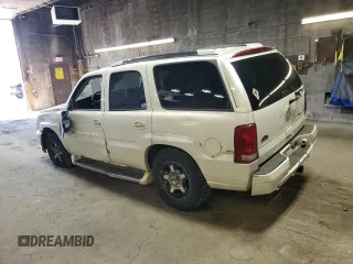 2005 Cadillac Escalade z VIN 1GYEK63N85R144130, wystawiony jako Copart lot #53692705 z przebiegiem 241 039 mil mil oraz Szkoda całkowita • Salvage title. Historia ofert i sprzedaży dostępna na DreamBid. Obrazek 2.