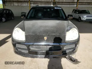 2006 Porsche Cayenne S with VIN WP1AB29P56LA66639, listed as a Copart auction lot 52097595 with 180,827 mi miles and Salvage title. Bid and sale history available at DreamBid. Image 5.