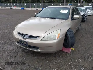 2004 Honda Accord EX with VIN 1HGCM66514A061236, listed as a IAAI auction lot 42565461 with 214,605 mi miles and . Bid and sale history available at DreamBid. Image 6.