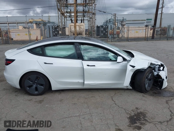 2021 Tesla Model 3 Long Range with VIN 5YJ3E1EB8MF860282, listed as a IAAI auction lot 41787008 with 49,730 mi miles and . Bid and sale history available at DreamBid. Image 13.