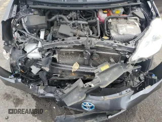 2014 Toyota Prius One z VIN JTDKDTB33E1066355, wystawiony jako Copart lot #58524285 z przebiegiem Nie podano mil oraz Szkoda całkowita • Salvage title. Historia ofert i sprzedaży dostępna na DreamBid. Obrazek 11.