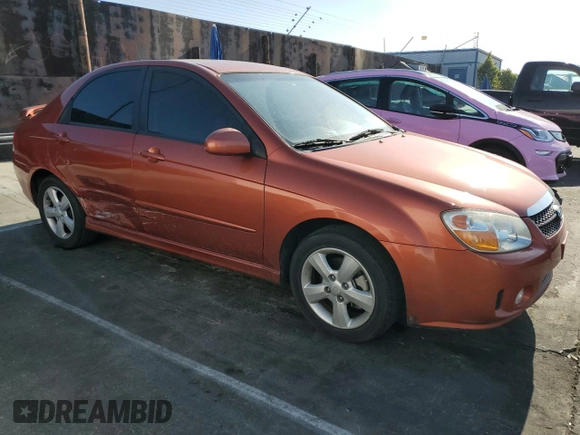 2009 Kia Spectra EX with VIN KNAFE222995027376, listed as a Copart auction lot 52406025 with 73,692 mi miles and Salvage Title. Bid and sale history available at DreamBid. Image 4.
