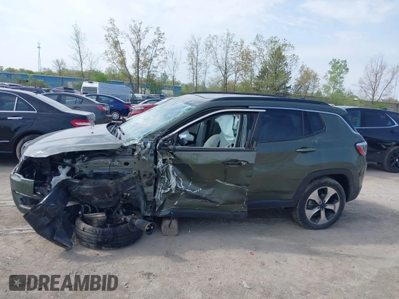 2018 Jeep Compass Latitude with VIN 3C4NJDBB4JT176031, listed as a IAAI auction lot 42125161 with 32,761 mi miles and . Bid and sale history available at DreamBid. Image 14.