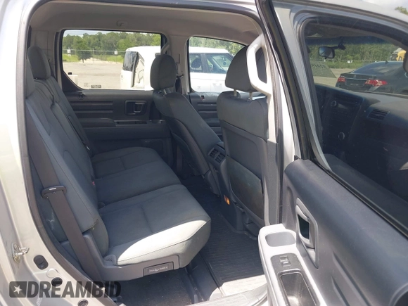 2008 Honda Ridgeline RT with VIN 2HJYK16228H524622, listed as a IAAI auction lot 42445595 with 209,649 mi miles and . Bid and sale history available at DreamBid. Image 8.