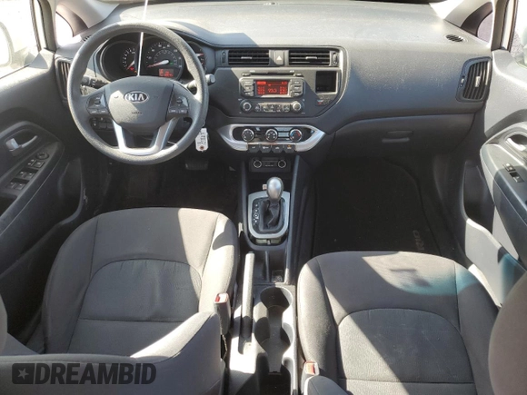 2014 Kia Rio LX with VIN KNADM4A38E6415462, listed as a Copart auction lot 52143555 with 60,079 mi miles and Salvage Title. Bid and sale history available at DreamBid. Image 8.