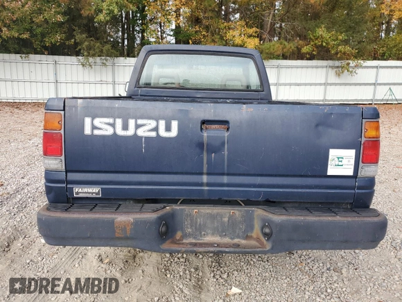 1993 Isuzu Pickup S z VIN 4S1CL11L2P4207469, wystawiony jako Copart lot #79279374 z przebiegiem 144 885 mil mil oraz Tytuł czysty. Historia ofert i sprzedaży dostępna na DreamBid. Obrazek 6.