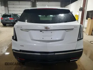 2021 Cadillac XT5 AWD Sport with VIN 1GYKNGRS5MZ142444, listed as a Copart auction lot 54502285 with 27,070 mi miles and Salvage title. Bid and sale history available at DreamBid. Image 6.