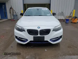 2015 BMW 2 Series 228i xDrive with VIN WBA1F7C55FVX95879, listed as a Copart auction lot 50167085 with 84,804 mi miles and Salvage Title. Bid and sale history available at carsss.com. Image 5.